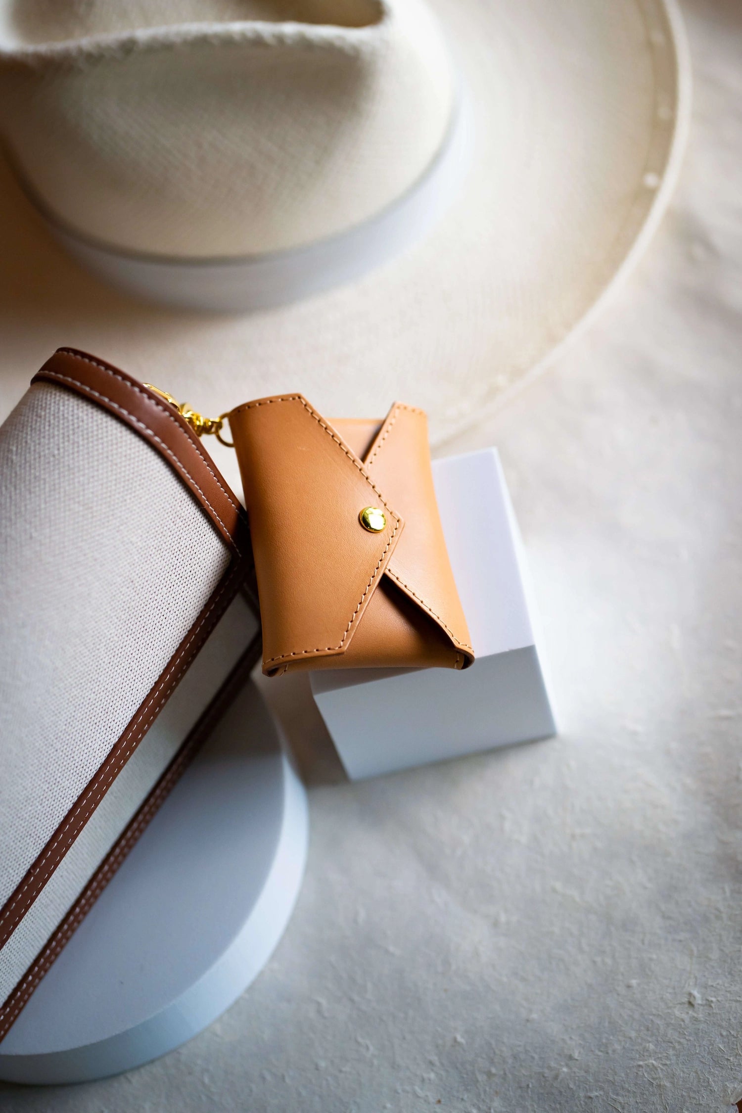 Sidecar ID envelope with premium leather finish and snap closure, designed to securely hold identification and small essentials.v