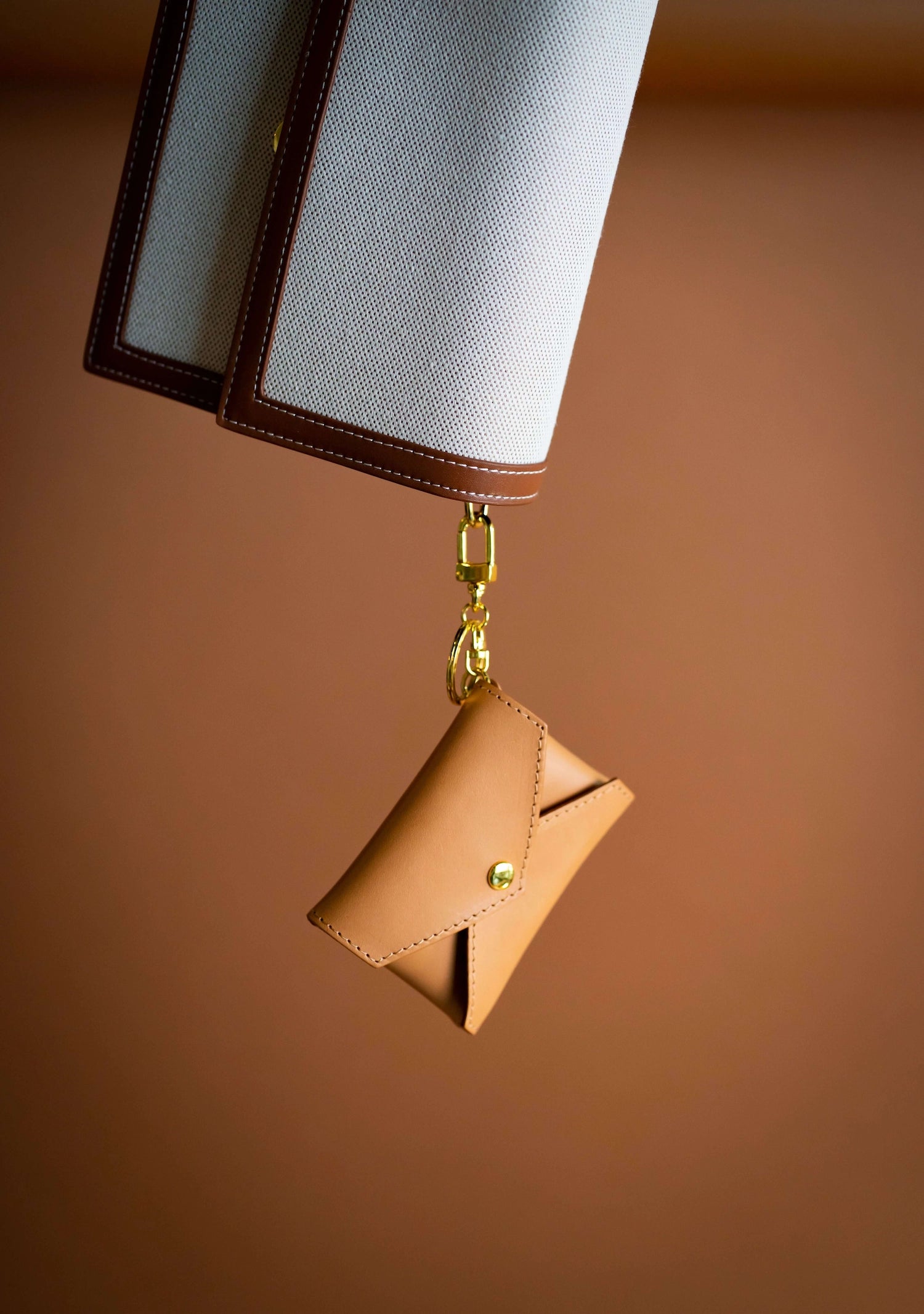 Sidecar ID envelope with premium leather finish and snap closure, designed to securely hold identification and small essentials.