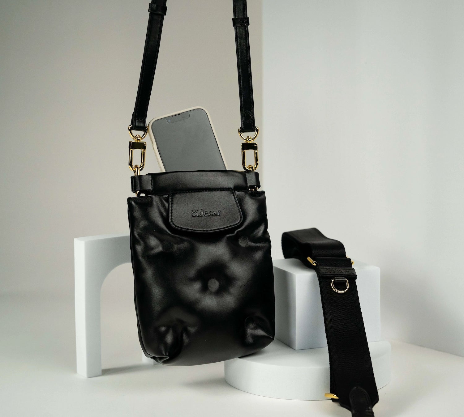 Percy Phone Pouch Two Piece Holiday Set. Genuine soft leather quilted, waterproof Percy Phone Pouch with + Nylon Purse Strap and matching Coin Purse in our black Sable. Complete luxury, hands free style.