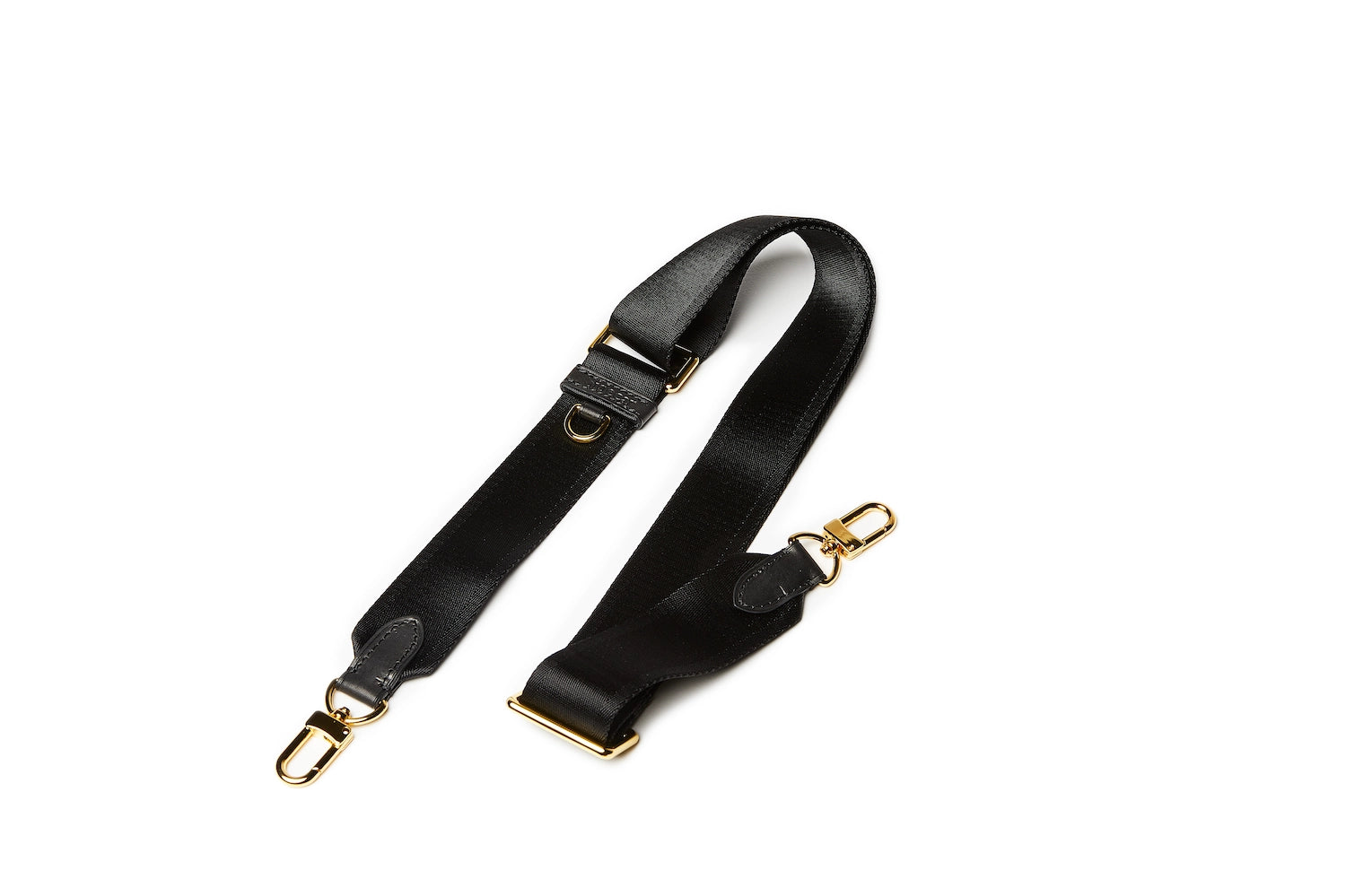 Sidecar black sable nylon purse strap, featuring a smooth durable design, gold accents, and adjustable length for bags.