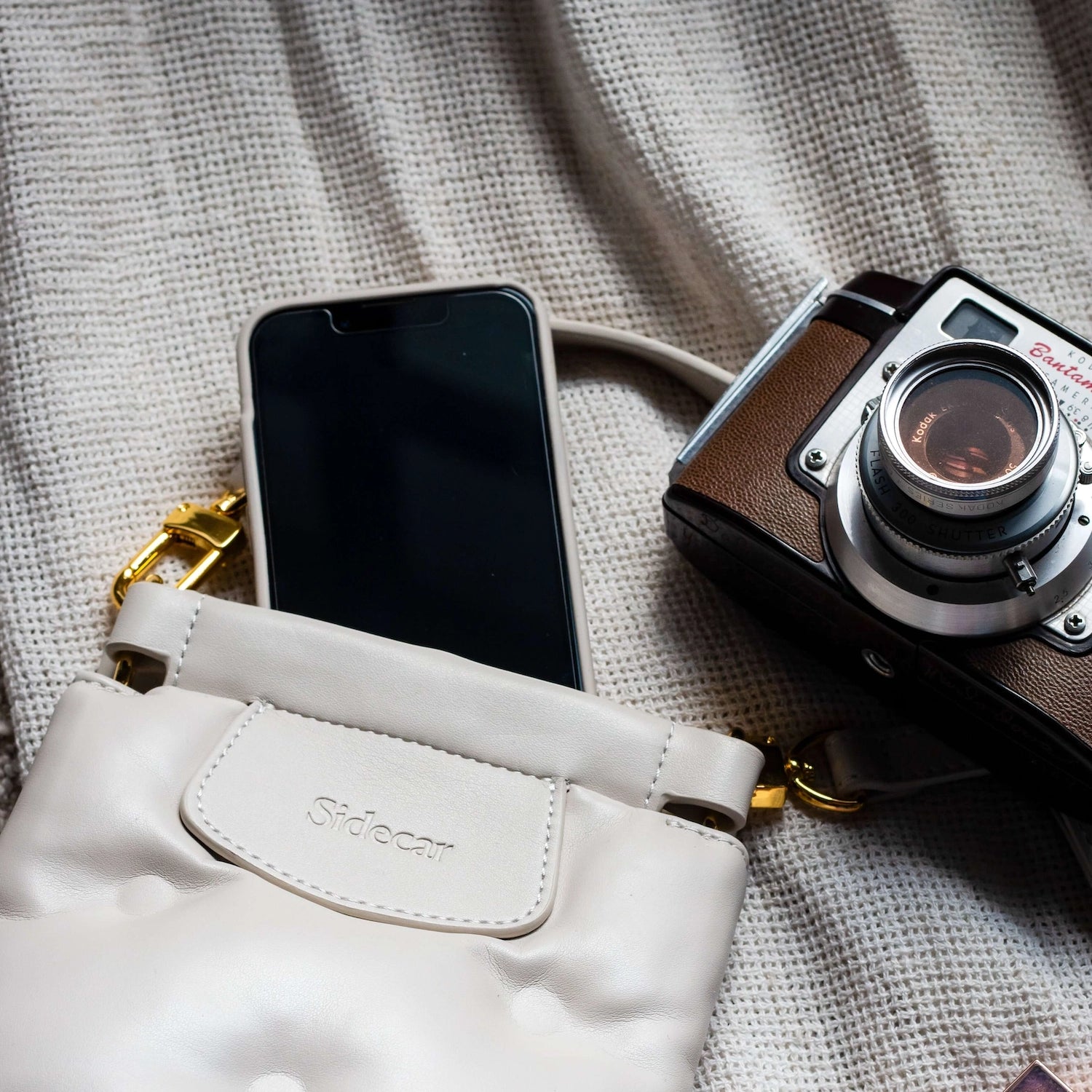 Percy Phone Pouch Two Piece Holiday Set. Genuine soft leather quilted, waterproof Percy Phone Pouch with + Nylon Purse Strap and matching Coin Purse in our neutral Stone. Complete luxury, hands free style.