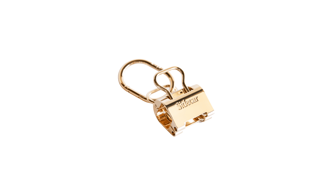 Sidecar Holiday Duo Set bundle with two patented hat clips in 14K gold and silver, featuring matching oval hinge clasps for hands-free hat carrying without bending or damage.